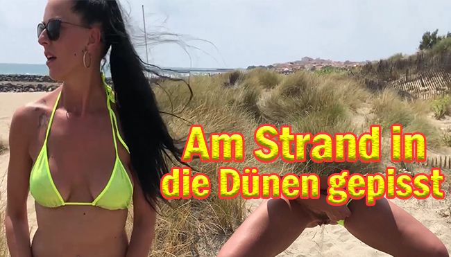 Am Strand in die Dünen gepisst.